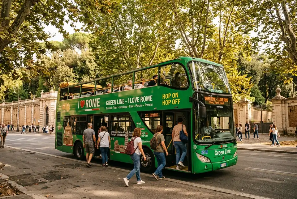 Green line i love rome hop on hop off bus stopped near Villa Borghese gardens with passengers boarding under leafy trees